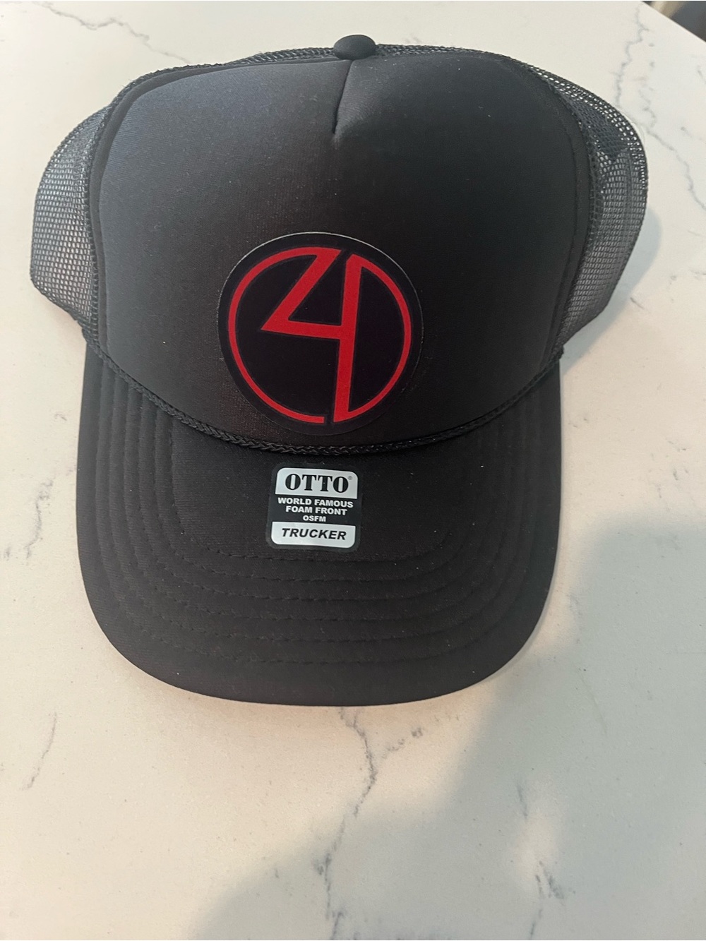 OTTO Black Trucker Hat with Red Circle Logo